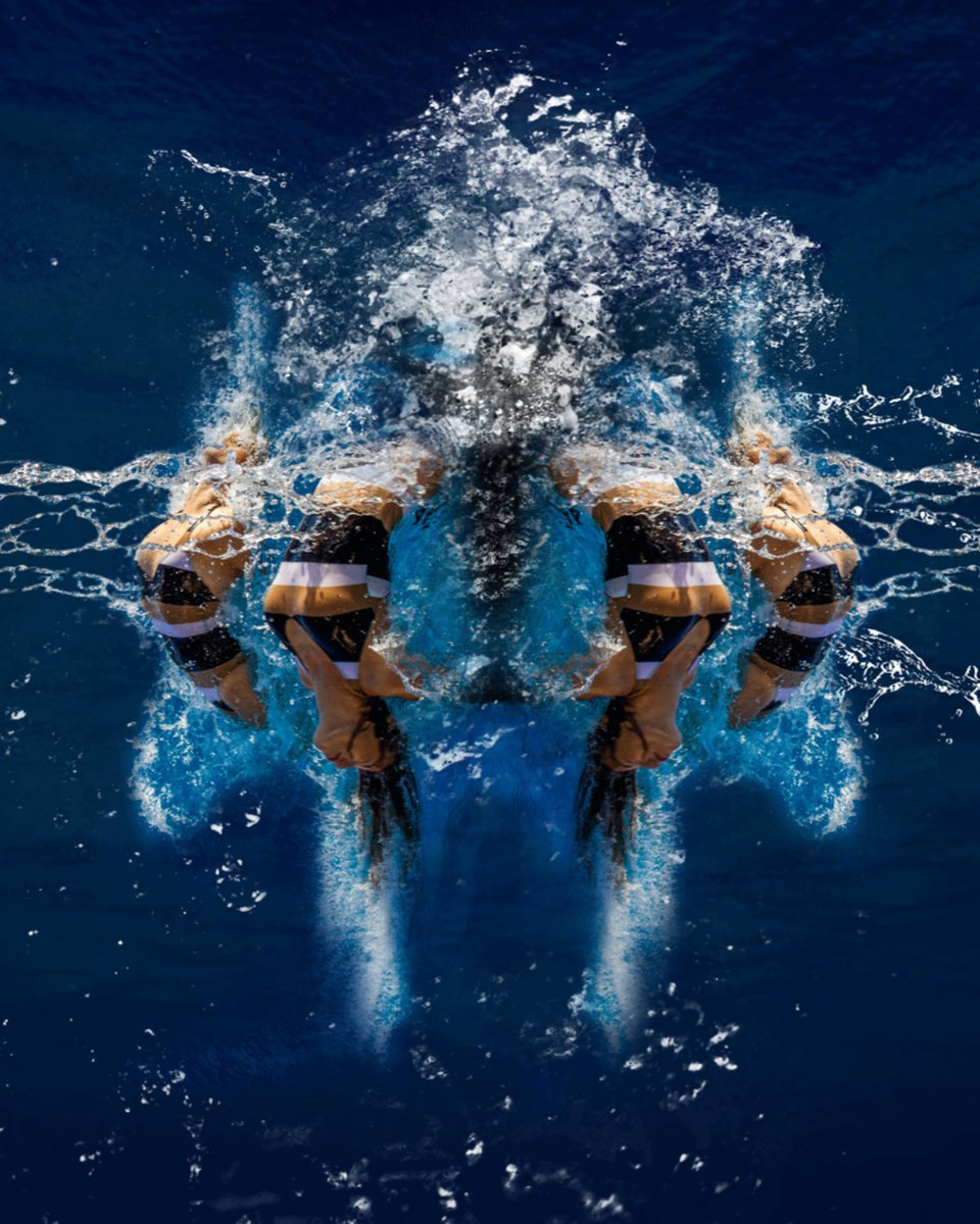 Aqualillies synchronized swimmers performing at a luxury event